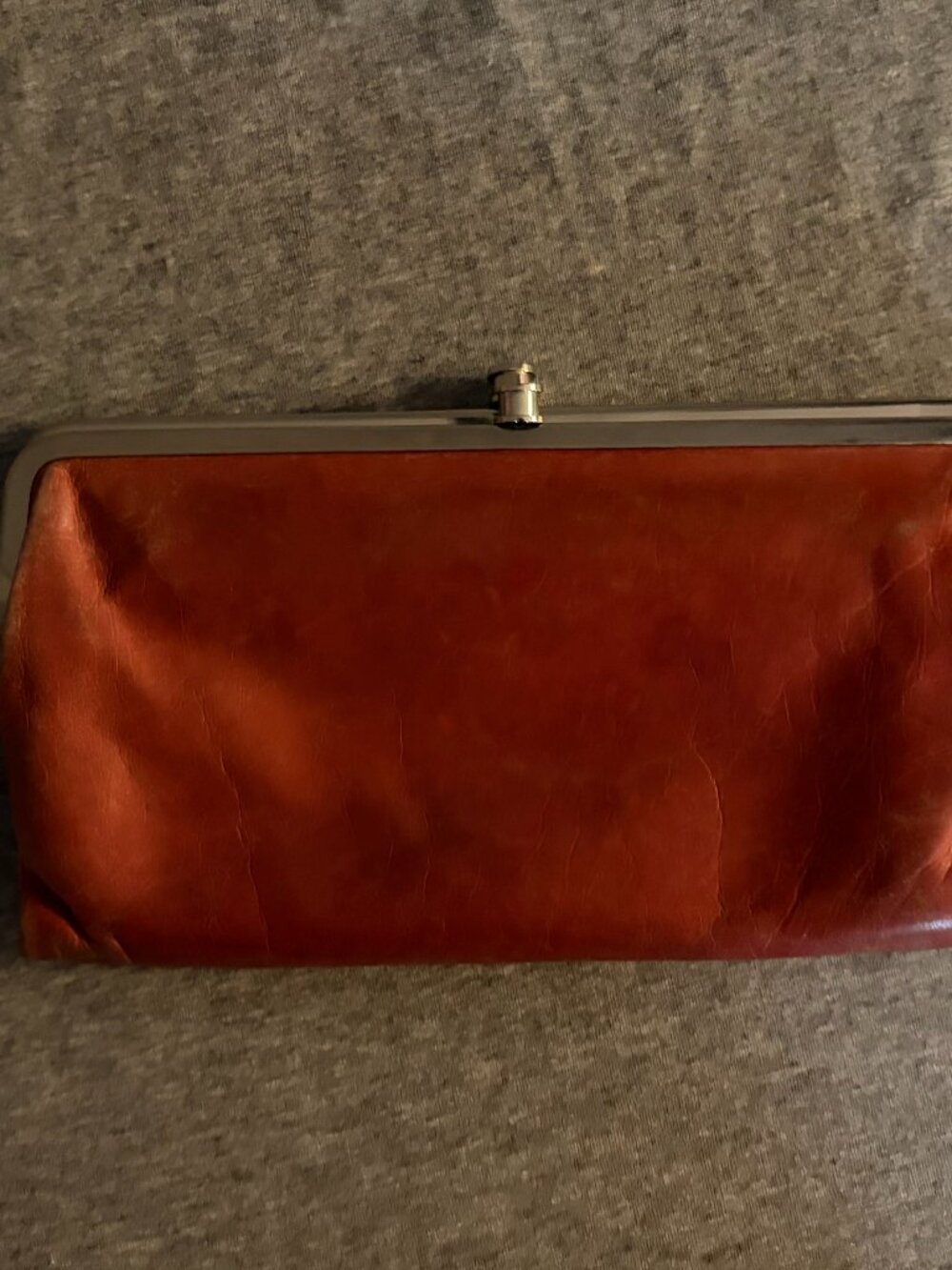 Hobo International Lauren Clutch Wallet in the color Salmon
